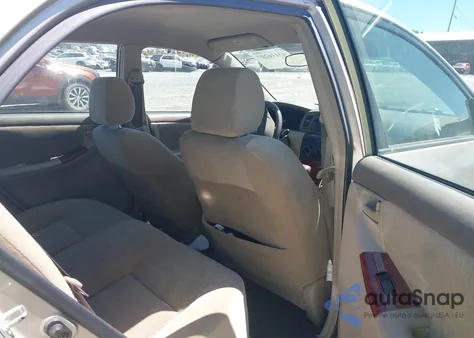 2005 Toyota Corolla Le z USA, uszkodzony, nr VIN 2T1BR32E35C465443